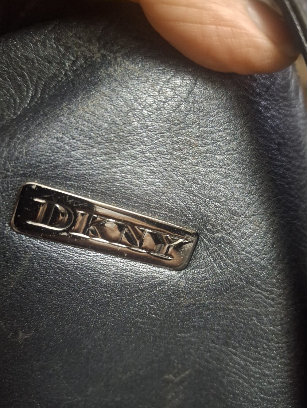 DKNY Womens  Black Leather Bag with Polished Silver Logo Plate